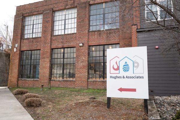 Hughes & Associates office entrance with company sign